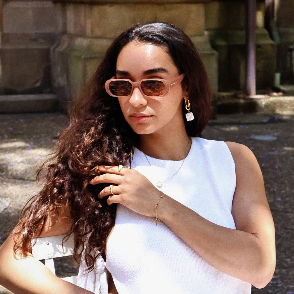 Unisex trendy sunglasses with modern polarised lenses. Stylish oval sunglasses inspired by classic vintage fashion.