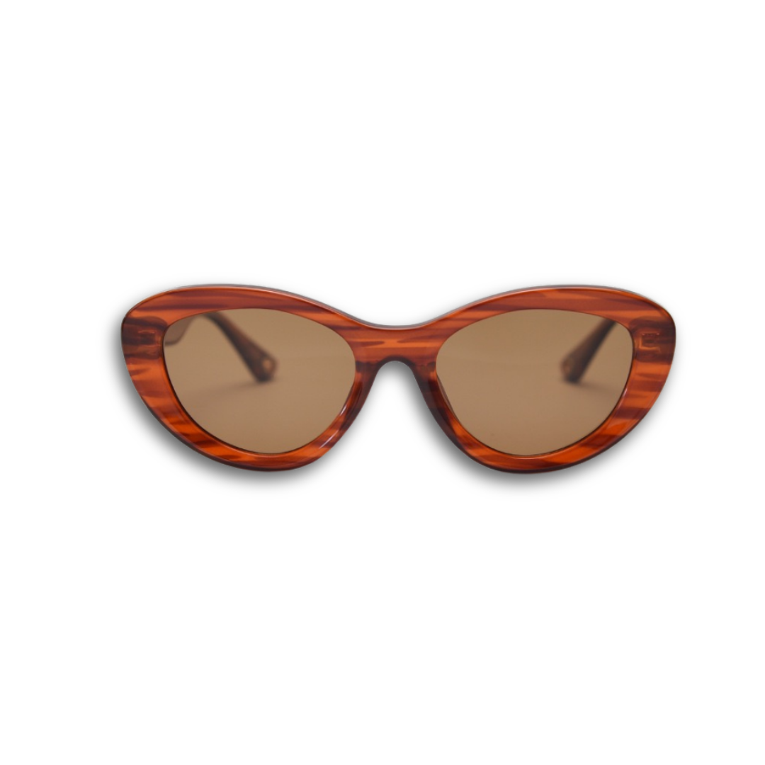 Stylish unisex cat-eye sunglasses by By Charley, featuring a rich reddish-brown frame and polarized lenses that offer 100% UV protection and glare reduction for a confident, retro-inspired statement.