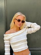 Classic unisex round sunglasses by By Charley, featuring polarized lenses that offer 100% UV protection and anti-glare functionality with a timeless vintage aesthetic.