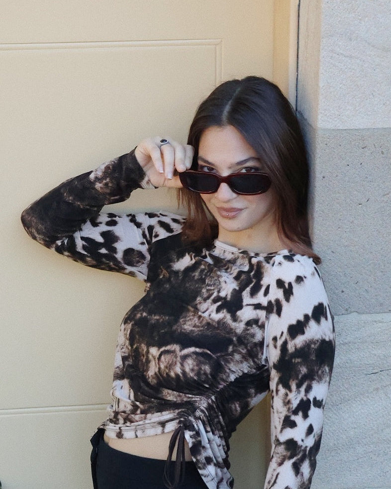 Red polarized rectangle sunglasses for women, UV400 protective lenses, chic summer eyewear accessory.

