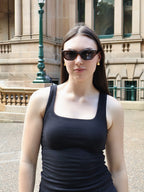 Stylish unisex polarized cat-eye sunglasses by By Charley, featuring a classic tortoiseshell frame that offers 100% UV protection and glare reduction for a bold, vintage-inspired aesthetic.
