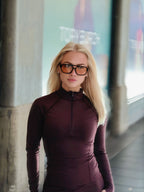 Stylish unisex polarized aviator sunglasses by By Charley, featuring a classic tortoiseshell frame and amber lenses that reduce glare and enhance contrast for a bold, retro look.