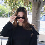 Playful and retro unisex oval sunglasses by By Charley, featuring a distinctive tortoiseshell frame and polarized lenses that offer 100% UV protection and glare reduction for a unique, fashion-forward look.