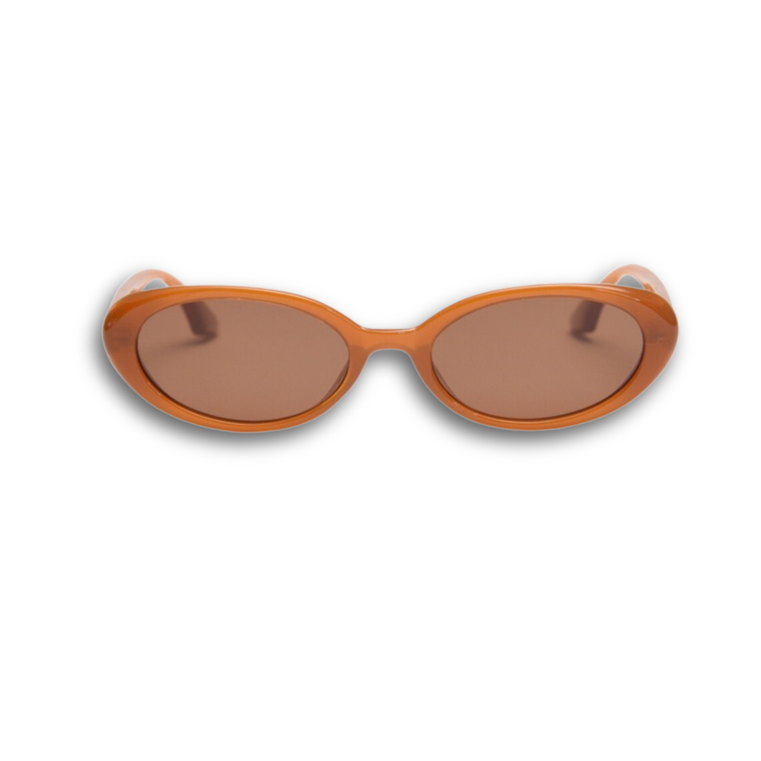 Make a unique statement with these playful oval sunglasses from By Charley. The retro unisex design in a warm pumpkin color features polarized lenses for all-day comfort.