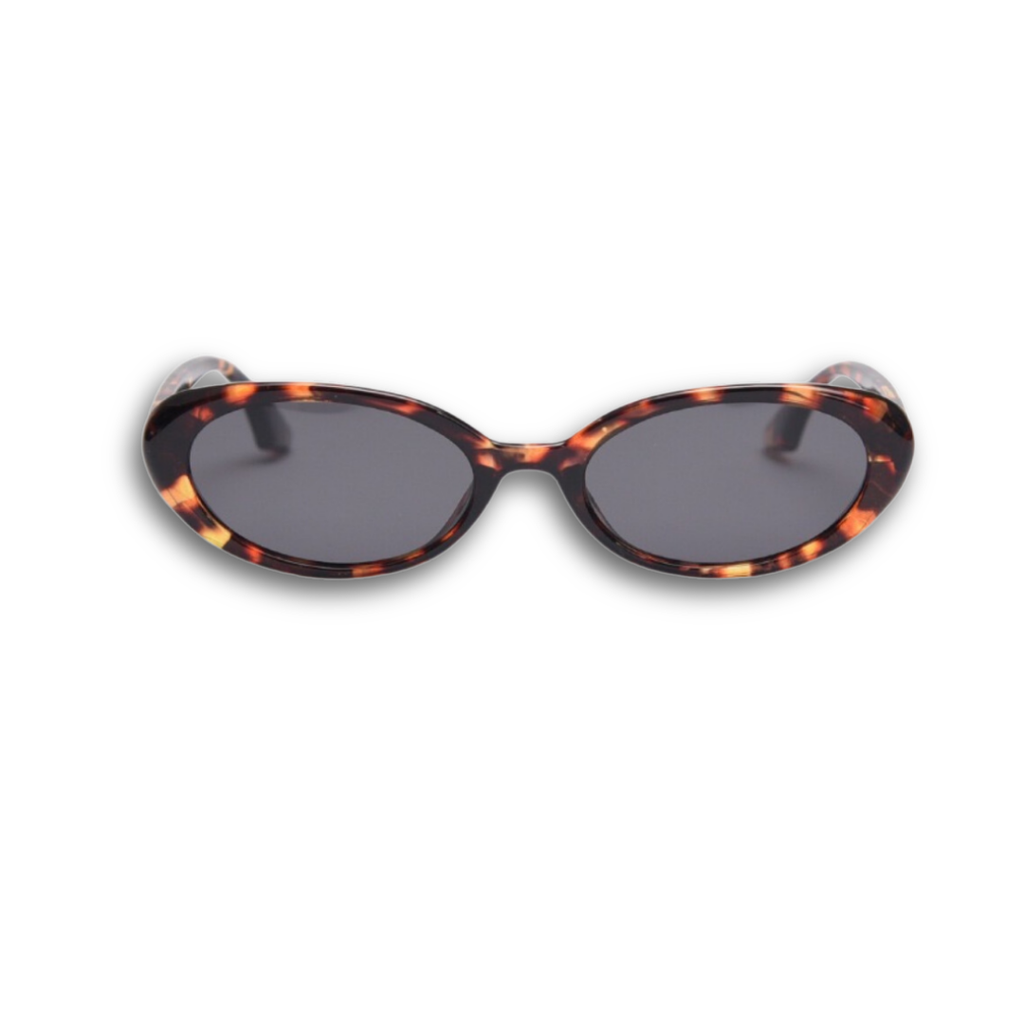 Playful and retro unisex oval sunglasses by By Charley, featuring a distinctive tortoiseshell frame and polarized lenses that offer 100% UV protection and glare reduction for a unique, fashion-forward look.