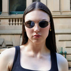 Achieve a classic, intellectual look with these unisex round polarized sunglasses from By Charley, designed for style and visual comfort.