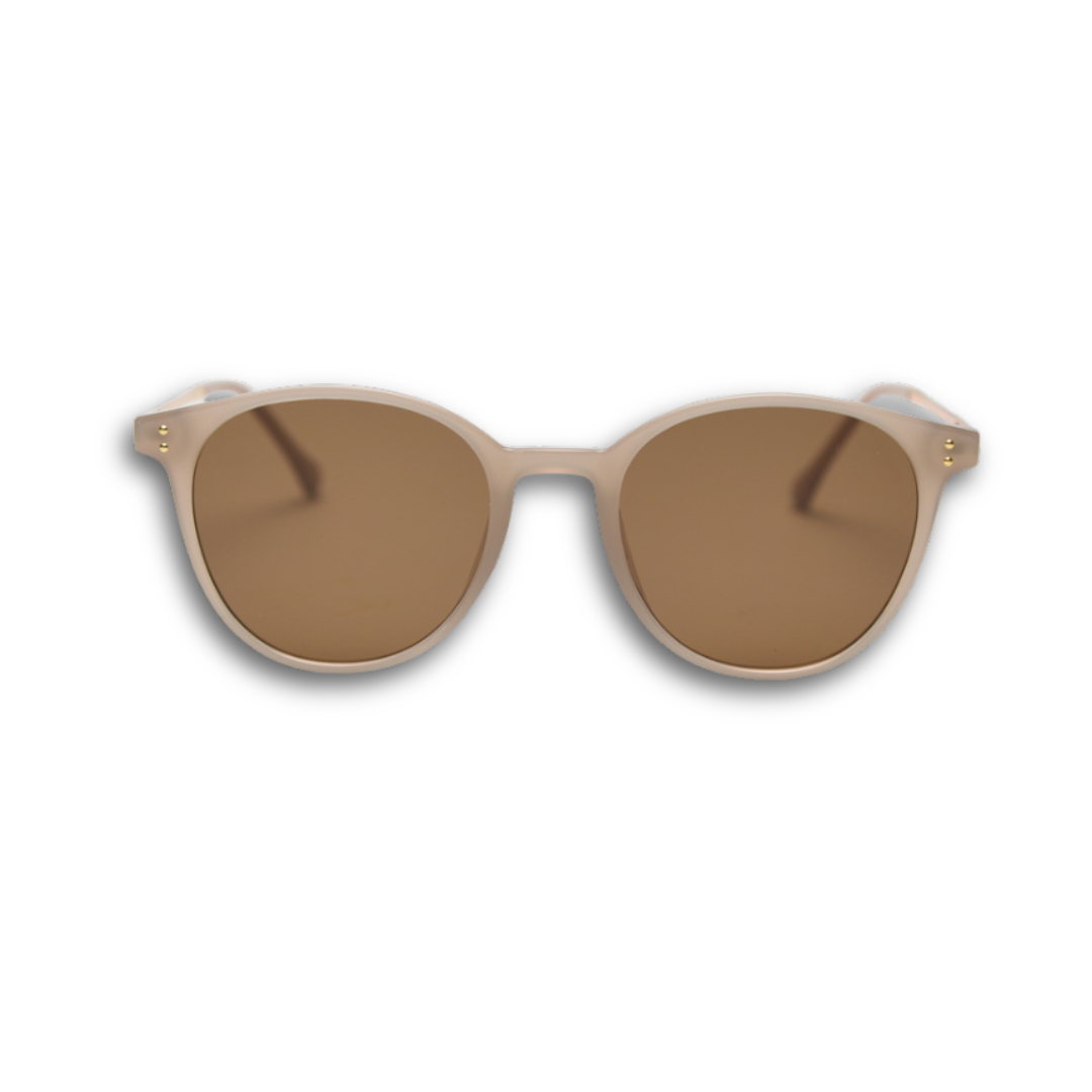 The Arden sunglasses in soft beige, highlighting light round frames perfect for a gentle, airy summer style.