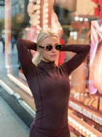 Achieve a classic, intellectual look with these unisex round polarized sunglasses from By Charley, designed for style and visual comfort.