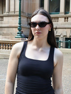 Stylish unisex polarized cat-eye sunglasses by By Charley, featuring a classic tortoiseshell frame that offers 100% UV protection and glare reduction for a bold, vintage-inspired aesthetic.
