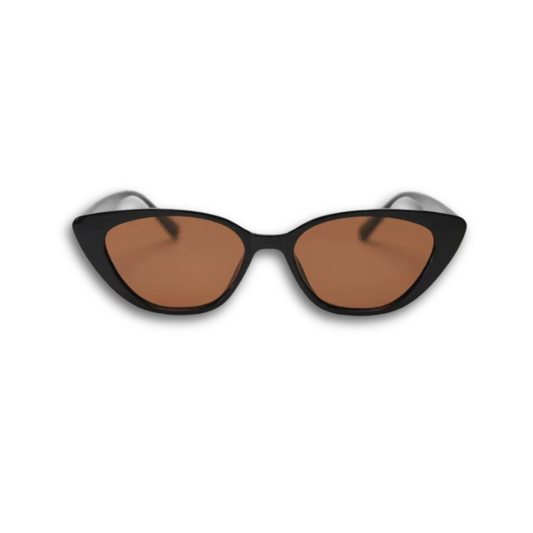 The Juno sunglasses in black with warm brown lenses, featuring a sleek cat-eye frame for a feminine and face-flattering look.