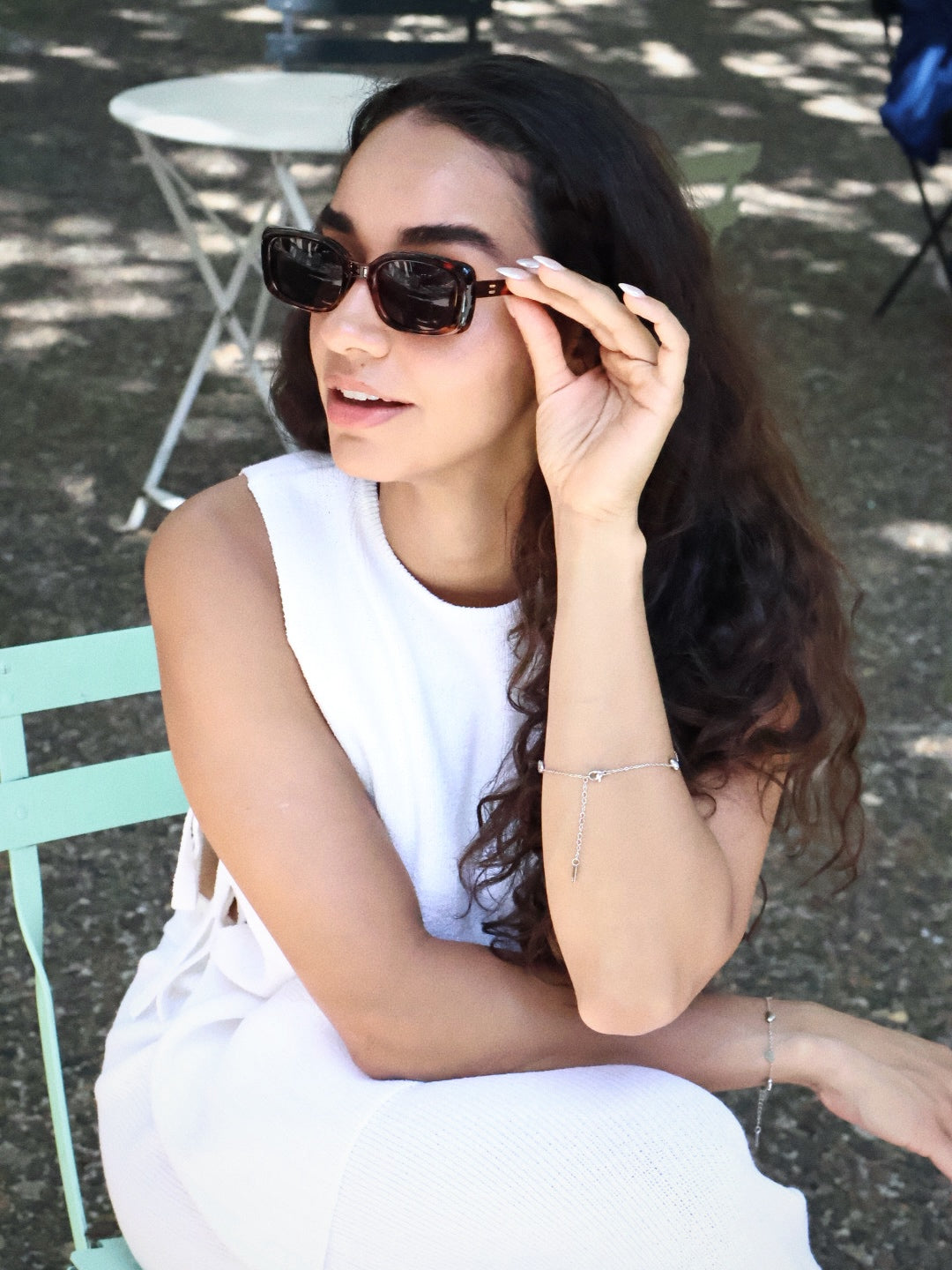 Stylish unisex square sunglasses by By Charley, featuring a classic tortoiseshell frame and polarized lenses that provide 100% UV protection and glare reduction for a confident, architectural aesthetic.