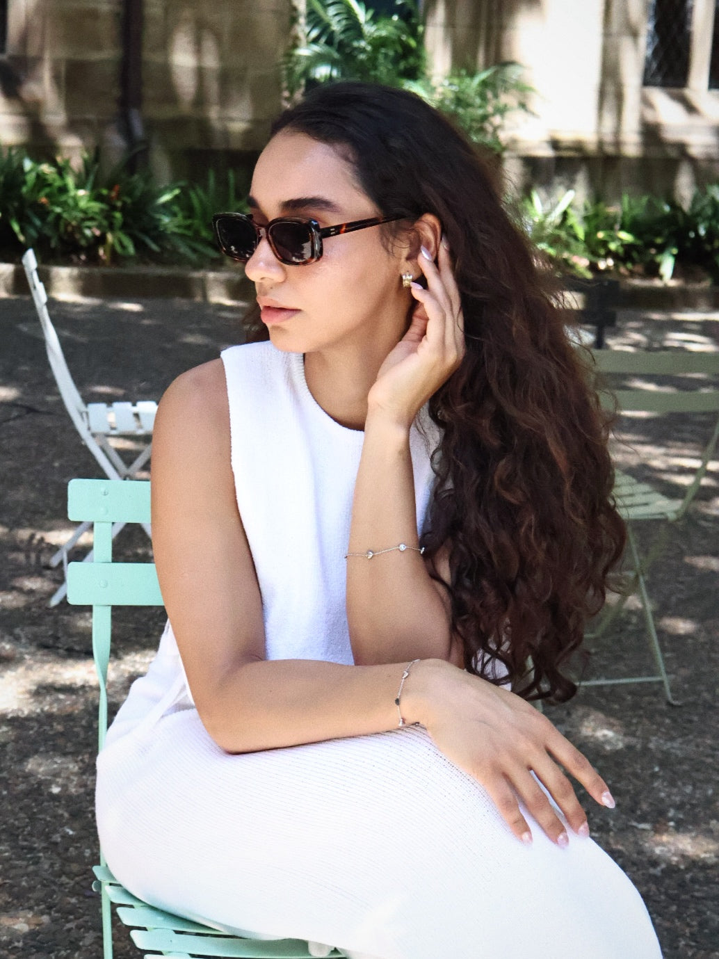 Stylish unisex square sunglasses by By Charley, featuring a classic tortoiseshell frame and polarized lenses that provide 100% UV protection and glare reduction for a confident, architectural aesthetic.