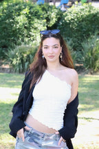 Stylish unisex cat-eye sunglasses by By Charley, featuring a black frame and polarized lenses that offer 100% UV protection and glare reduction for a confident, retro-inspired statement.