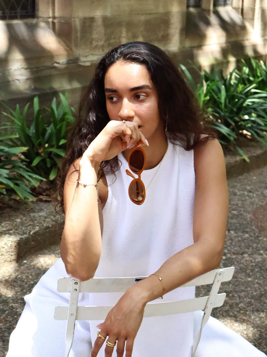 Make a unique statement with these playful oval sunglasses from By Charley. The retro unisex design in a warm pumpkin color features polarized lenses for all-day comfort.