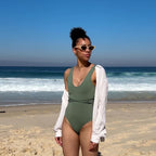 Playful unisex cat-eye sunglasses by By Charley, featuring a bold lemon frame and polarized lenses that offer 100% UV protection and glare reduction for a fun, retro-inspired statement.