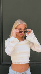 Classic unisex round sunglasses by By Charley, featuring polarized lenses that offer 100% UV protection and anti-glare functionality with a timeless vintage aesthetic.