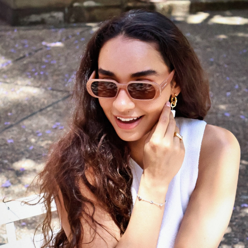 Unisex trendy sunglasses with modern polarised lenses. Stylish oval sunglasses inspired by classic vintage fashion.