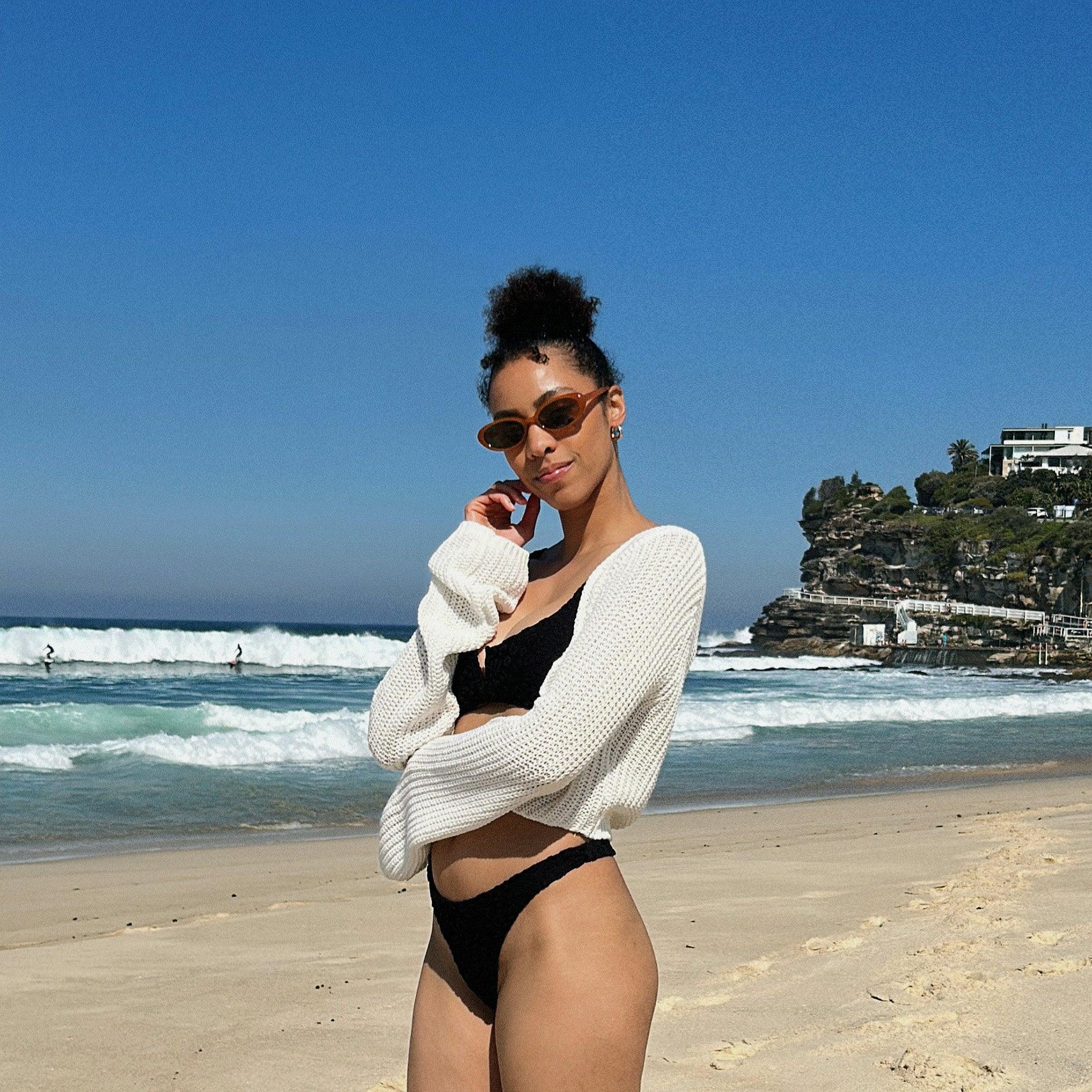 Make a unique statement with these playful oval sunglasses from By Charley. The retro unisex design in a warm pumpkin color features polarized lenses for all-day comfort.