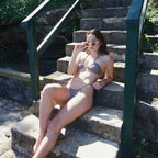 Playful unisex cat-eye sunglasses by By Charley, featuring a bold lemon frame and polarized lenses that offer 100% UV protection and glare reduction for a fun, retro-inspired statement.